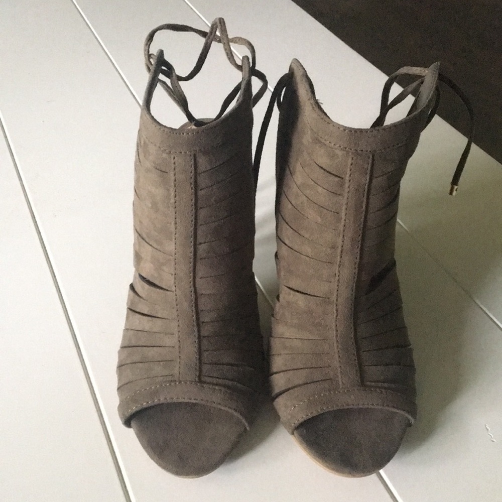 Army green cutout, lace up stilettos.